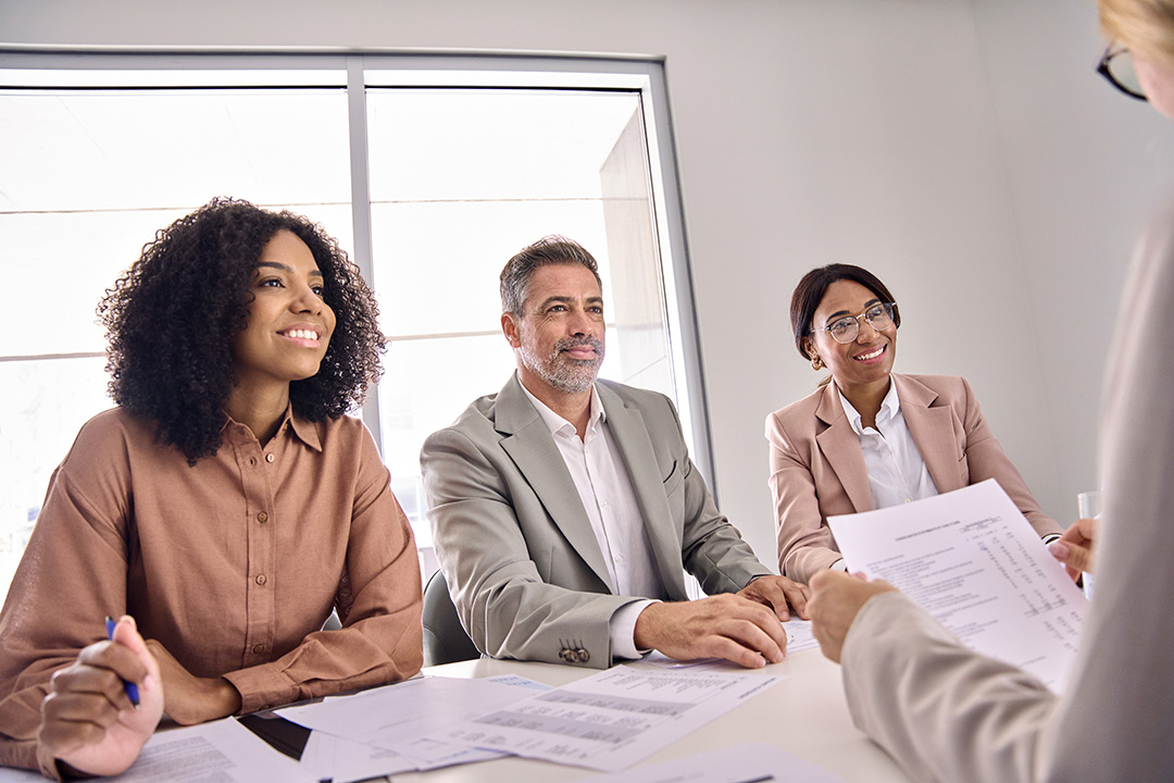 man being interviewed by 3 hiregy recruiting experts