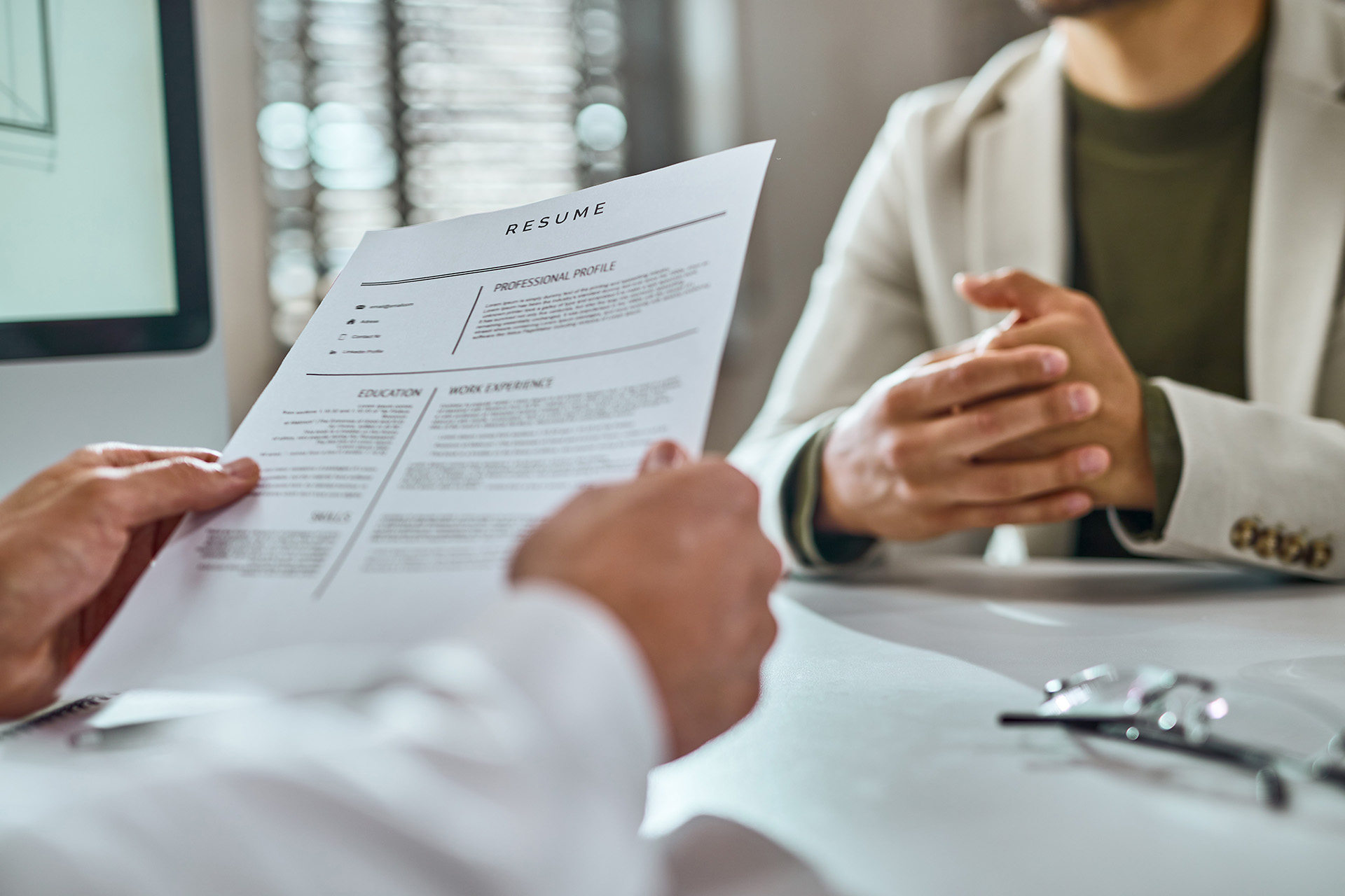 man holding a resume 