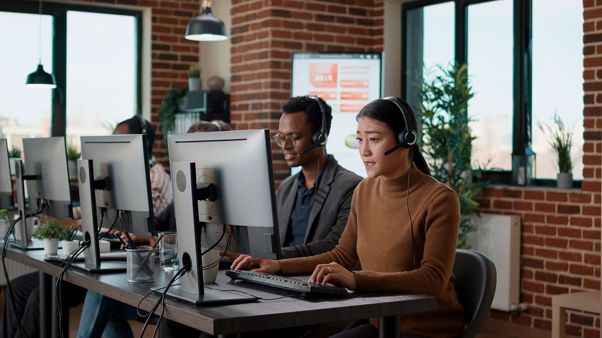 Call Center customer service representatives taking calls